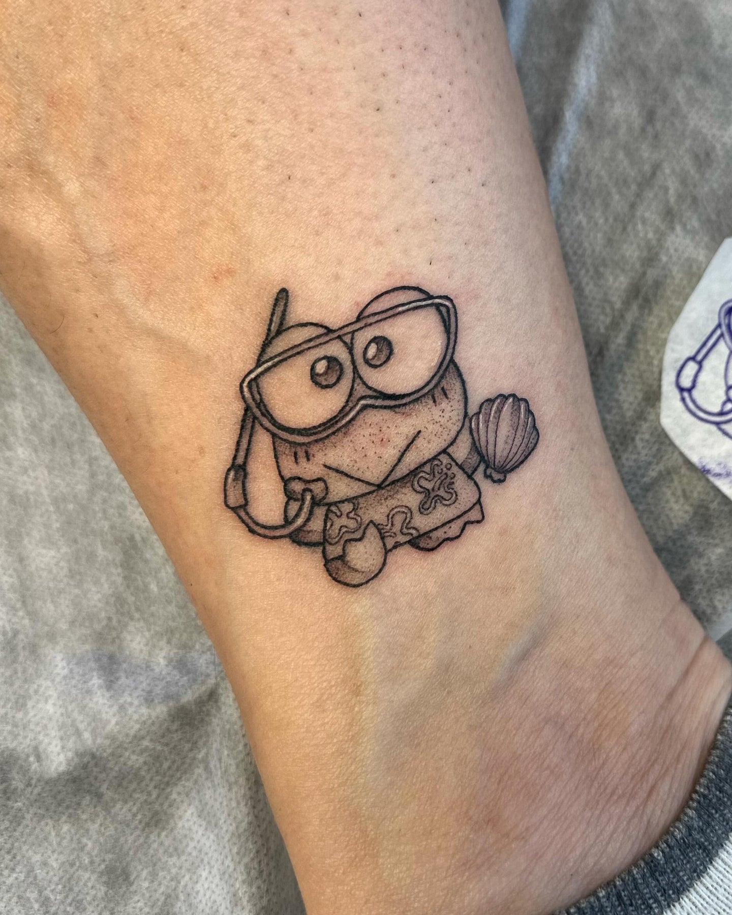 Hxllcat tattoo work at Beach Park Tattoo