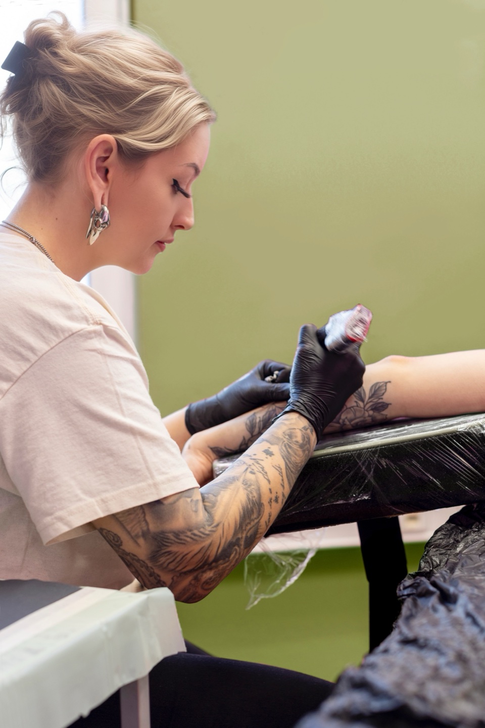 Kate working at Beach Park Tattoo Kailua