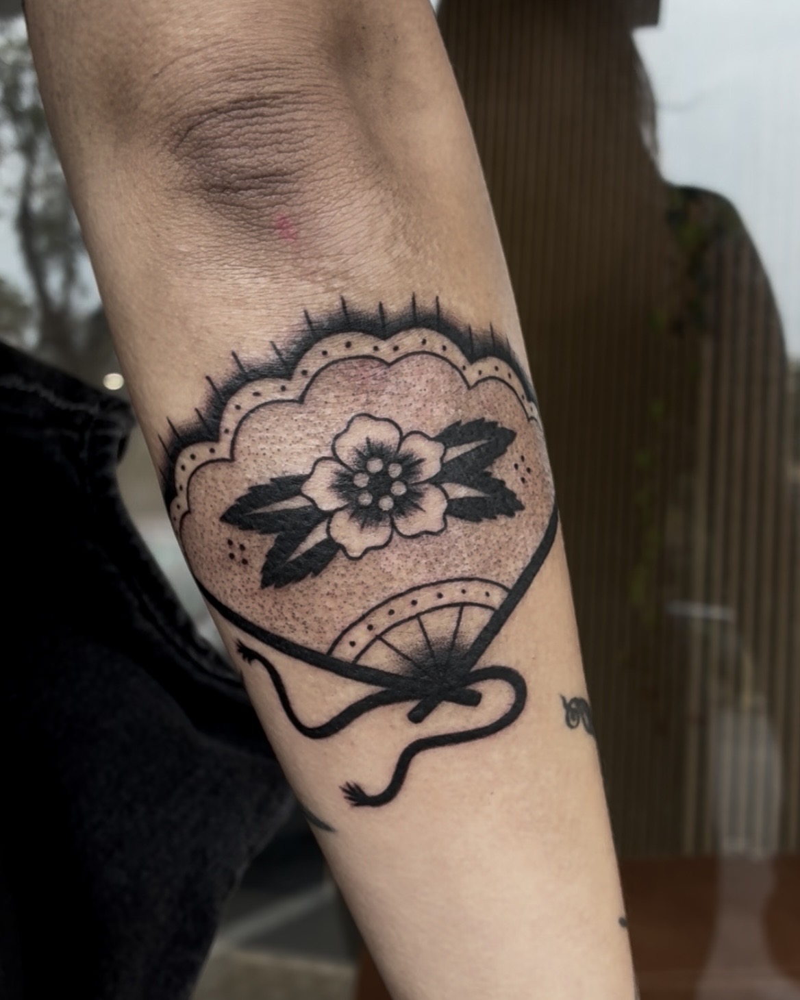 Lily tattoo work at Beach Park Tattoo