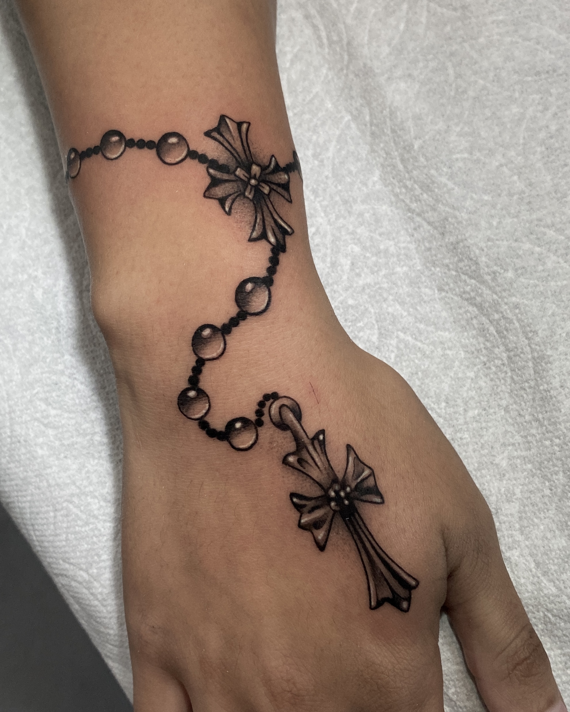 Lily tattoo work at Beach Park Tattoo